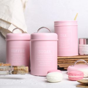 Pink-Tea-Coffee-Sugar-Canister-Set-Standing-Up-With-Macaroons-