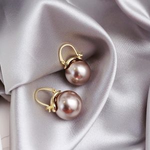 Pink-Pearl-Drop-Earrings-laying-down